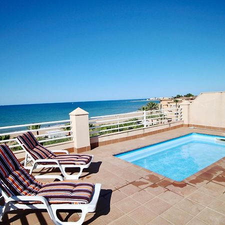 Apartamento Ático espectacular con piscina privada en primera línea de playa Dénia Habitación foto