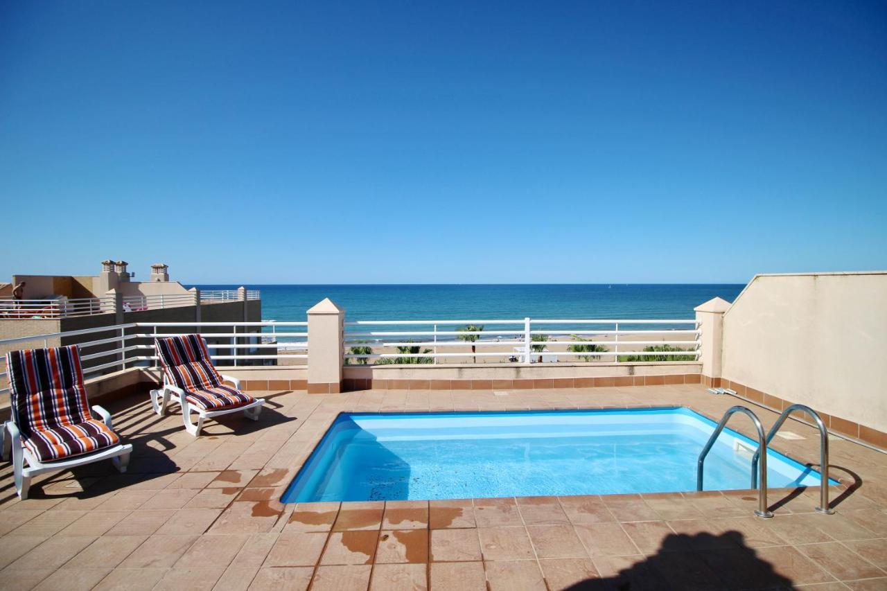 Apartamento Ático espectacular con piscina privada en primera línea de playa Dénia Habitación foto